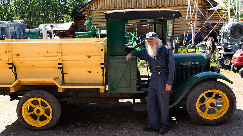 Marl in front of truck.