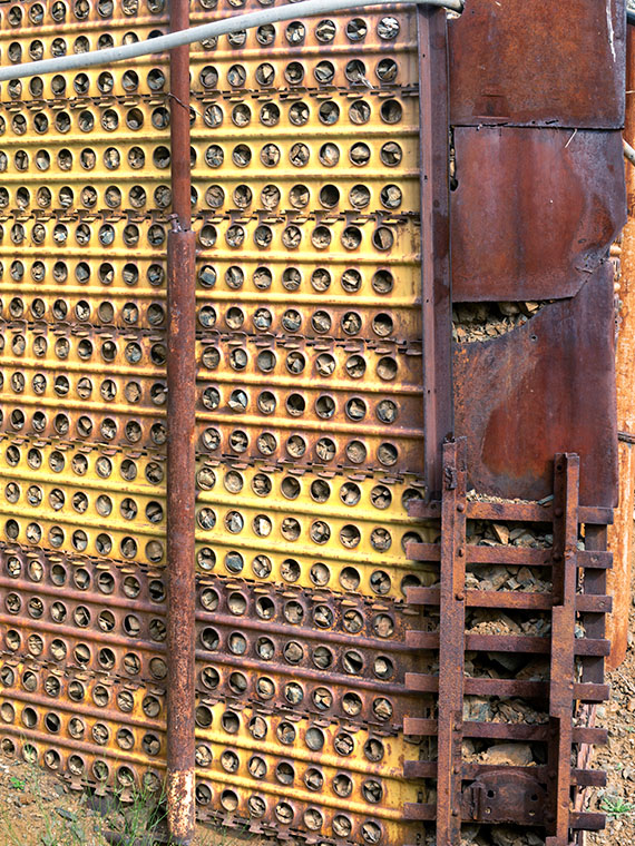 Retaining Wall - A retaining wall at the Anderson Mill made from surplus Army landing pads and steel plate.