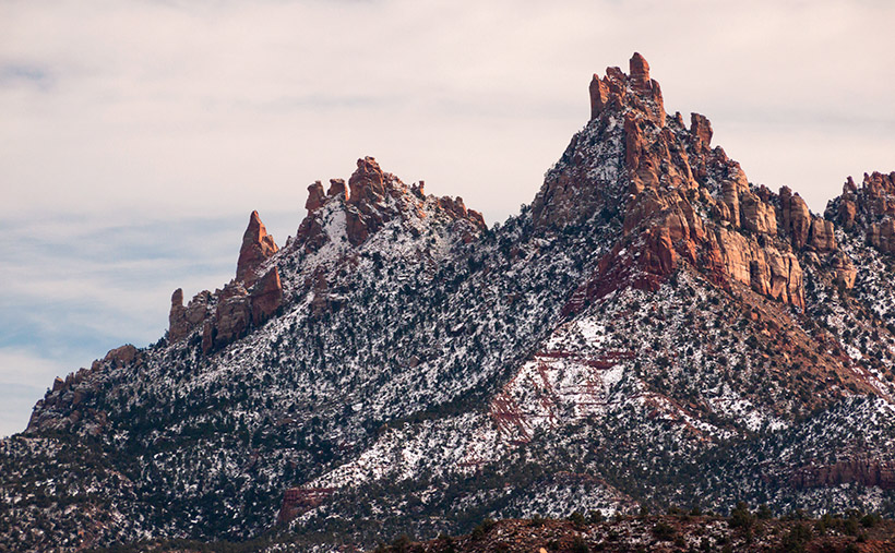 Eagle Crags - Red-rock Vermilion Cliff outcrops covered in snow make a perfect Christmas greeting card.