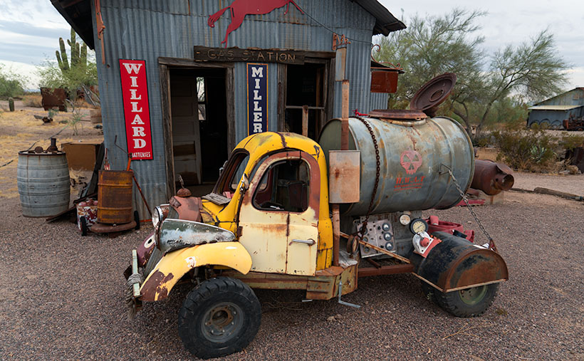 Patchwork truck made from various parts, standing guard outside Willard Miller station in Vulture City, Arizona