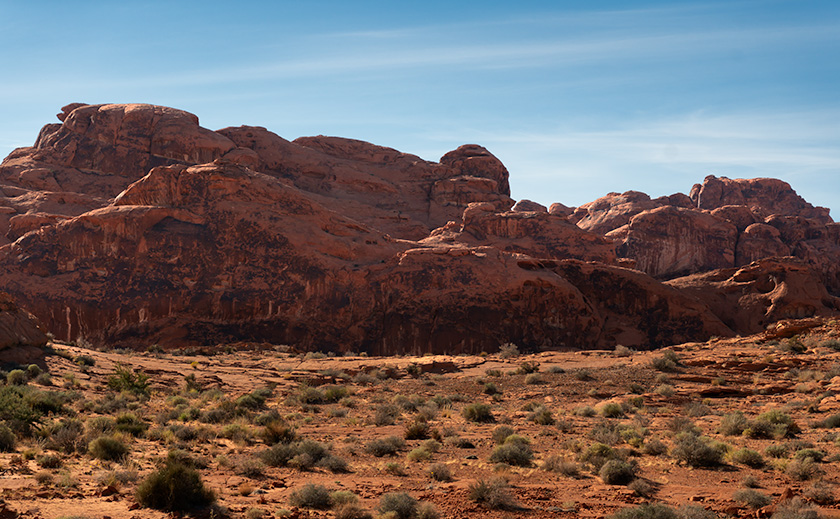 Red sandstone formations at Valley of Fire State Park, symbolizing the beauty of geologic processes over millennia.