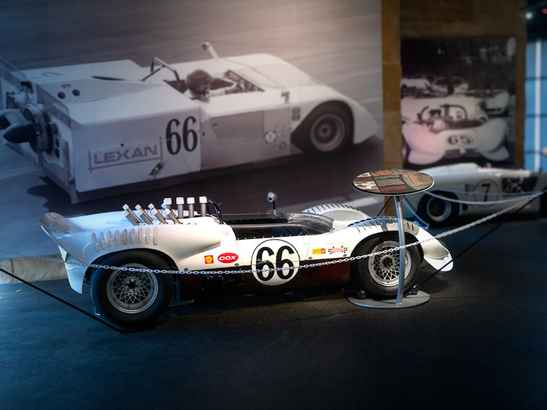 Chaparral cars showcasing airflow evolution in the Midland museum exhibit.
