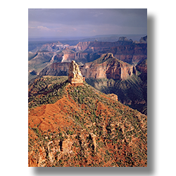 A summer storm passes over the Grand Canyon and Mount Hayden.