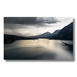 A summer storm brings rain to Lake St. Mary in Glacier NP.