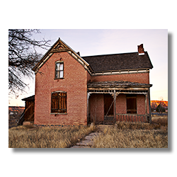 A historic brick house in Escalante Utah found along state route 12.