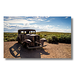 The shell of a 1932 Studebaker marks the location Route 66 intersected the Petrified Forest Road.