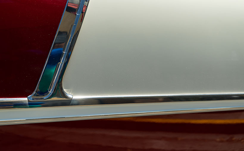 The unmistakeable two-tone paint scheme of a 1955 Cheverolet Bel Air on display at a car show in Kingman, Arizona.