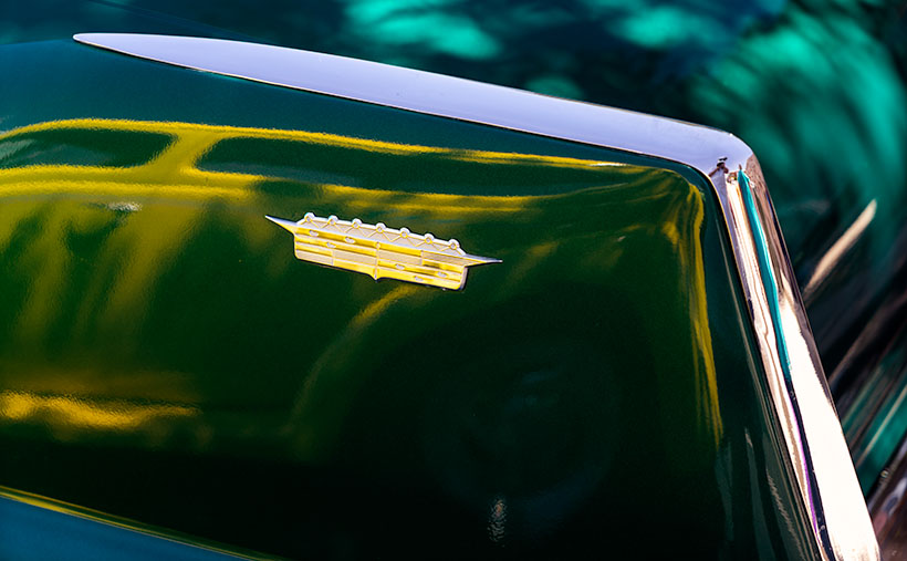 The distinctive tail fins of a 1958 Cadilac at a car show in Kingman, Arizona.